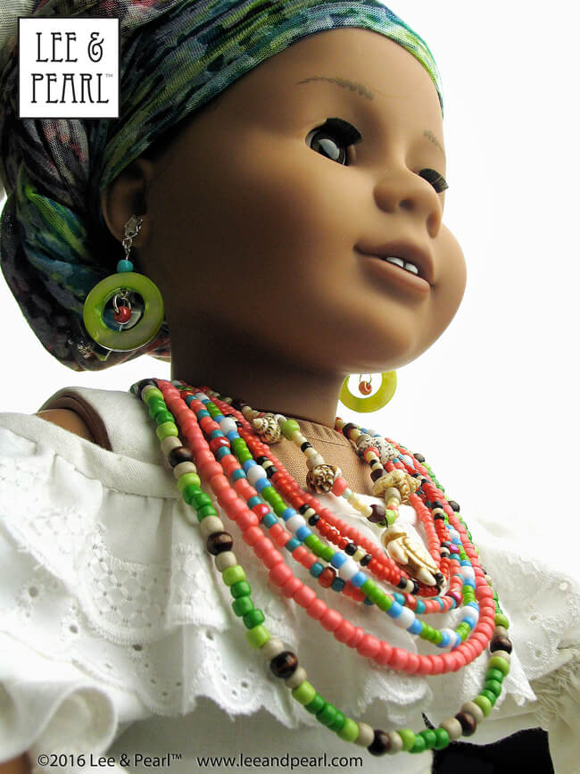 Introducing the Lee & Pearl 2016 FREE Pattern for mailing list subscribers — #1035: Olá Brasil! Samba Top, Bahia Dress, Afro-Brazilian Baiana Headwrap and Jewelry Tutorials for 18" Dolls, inspired by American Girl® 2016 Girl of the Year® Lea Clark®, and by the fashions, traditions and music of Brazil. To get your FREE copy, join our mailing list at http://www.leeandpearl.com before the end of January, 2017.