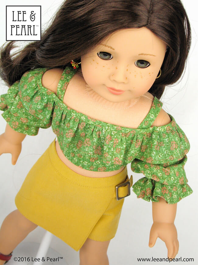 Introducing the Lee & Pearl 2016 FREE Pattern for mailing list subscribers — #1035: Olá Brasil! Samba Top, Bahia Dress, Afro-Brazilian Baiana Headwrap and Jewelry Tutorials for 18" Dolls, inspired by American Girl® 2016 Girl of the Year® Lea Clark®, and by the fashions, traditions and music of Brazil. To get your FREE copy, join our mailing list at http://www.leeandpearl.com before the end of January, 2017.