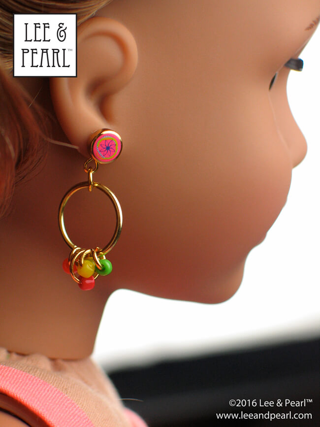 Introducing the Lee & Pearl 2016 FREE Pattern for mailing list subscribers —#1035: Olá Brasil! Samba Top, Bahia Dress, Afro-Brazilian Baiana Headwrap and Jewelry Tutorials for 18" Dolls - including these great hoop and bead earrings - inspired by American Girl® 2016 Girl of the Year® Lea Clark®, and by the fashions, traditions and music of Brazil. To get your FREE copy, join our mailing list at http://www.leeandpearl.com before the end of January, 2017.