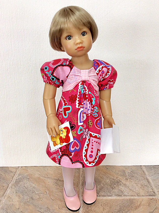 Our FREE GIFT to Lee & Pearl mailing list subscribers — Pattern 1038: The Gift Bow Front Dress for 18 Inch American Girl, 16 Inch A Girl for All Time and 14 1/2 Inch Wellie Wisher and similar dolls. Click to sign up! Jaci G made this dress for her tall, slender Kidz N' Cats® doll by PRINTING THE 16 INCH VERSION OF THE PATTERN AT 115%.