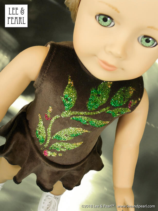 Let Lee & Pearl show you how to make intricate-looking embellishments for American Girl doll outfits using glitter, fabric glue and stencils — perfect for the skate and dance costumes from our Pattern 1055: Skating Dresses for 18 inch dolls.