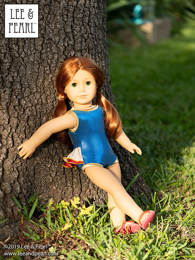Happy 4th of July! Who else is waiting for the fireworks to start? Our American Girl® doll is wearing a sparkly red-white-and-blue swimsuit that we made using Lee & Pearl Pattern 1058: Retro Ruffled Swimsuit and High Waisted Bikini for Dolls. Find this pattern in the Lee & Pearl Etsy store for 18 inch, 16 inch and 14 1/2 inch dolls.