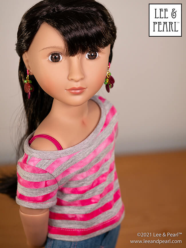 Introducing Pattern 1983: She's a Maniac Off-One-Shoulder Workout T-Shirt for Dolls! We're proud to present this brand new ‘80s / aerobics / workout and dance-inspired pattern for 18 inch American Girl®, 16 inch A Girl for All Time® and 14 ½ inch WellieWishers™ and similar dolls, now available in the Lee & Pearl Etsy store.