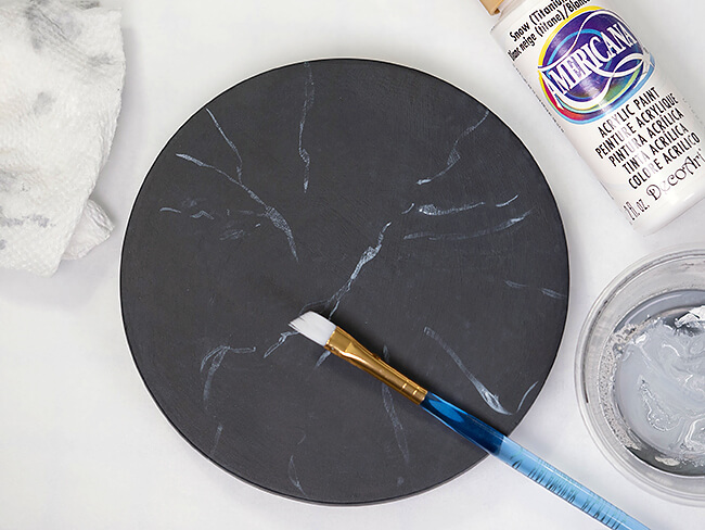 Here's a fun Halloween tutorial — follow our step-by-step directions to paint your own faux soapstone tabletop for dolls, just like the one we made for the Lee & Pearl Mad Scientist Laboratory extravaganza!