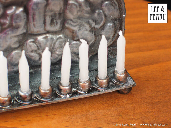 Happy Chanukah from Lee & Pearl! Make your 18 inch dolls their very own pressed metal Chanukah Menorah (Chanukiya) using a dollar store cookie sheet, cardboard, glue, plastic beads, a knitting needle, metallic paints and the techniques in our easy VIDEO TUTORIAL.