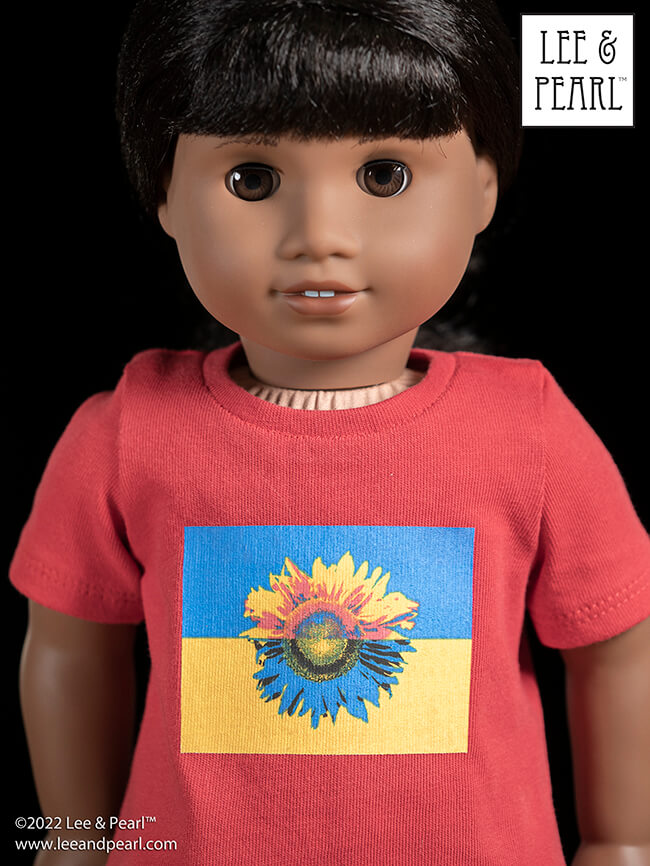 Lee & Pearl stand in solidarity with Ukraine. Mother Theresa once said — do small things, with great love. This is about the smallest thing we can do, but we offer it with all our love for the people of Ukraine in the horror they face. CLICK to visit our newsletter and download the FREE Ukraine Flag and Sunflower Heat Transfer for 18 Inch, 16 Inch and 14 1/2 Inch Doll T-Shirts Printable PDF. Thank you!