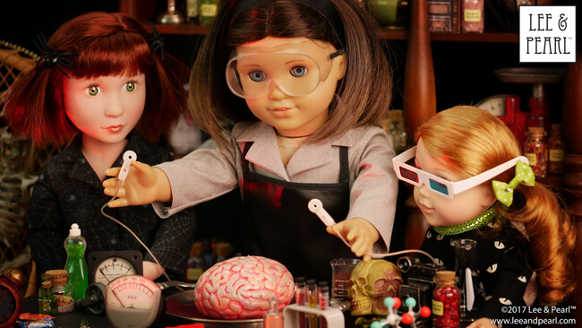 Welcome to the Lee & Pearl Mad Scientist Laboratory! Visit the lab with American Girl Doll Chrissa, A Girl for All Time Clementine and Wellie Wisher Willa — and see how we built and assembled their costumes, furniture, equipment and props, including a monstrously realistic doll brain painting tutorial. Then get our Pattern 1025: She Blinded Me with Science Unisex Lab Coat and Safety Goggles for Dolls as our FREE gift when you join the Lee & Pearl mailing list in 2017. Bwahahah!