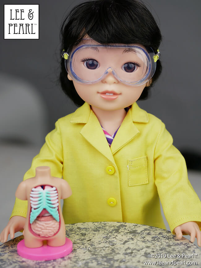 Lee & Pearl Pattern 1025: She Blinded Me with Science Unisex Lab Coat, Unlined Coat and Safety Goggles for 18 inch, 16 inch and 14 1/2 inch dolls is NOW AVAILABLE for purchase! We packed this pattern with just-like-the-real-thing features for all your STEM-lovers, astronauts, doctors and doll veterinarians. With the perfect fit of this versatile pattern you can make lab coats and goggles — or stylish jackets and raincoats as well! Find this pattern at https://www.etsy.com/shop/leeandpearl