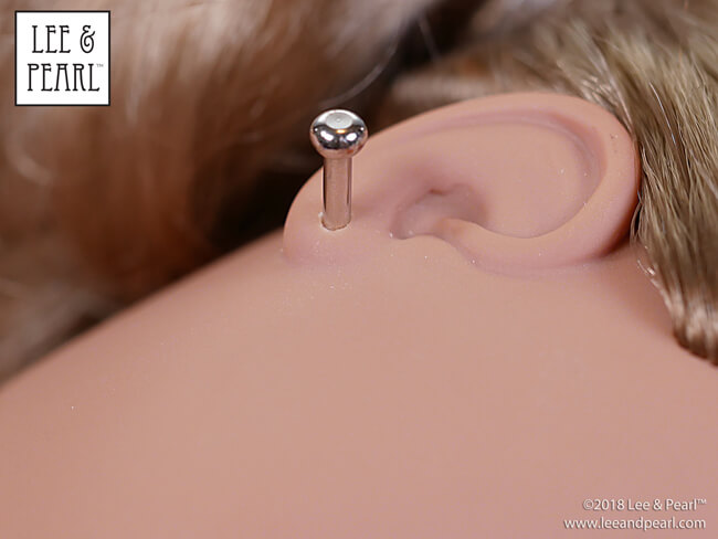 Pierce your own doll's ears at home with the instructions in the Lee & Pearl Introduction to Jewelry Making for Vinyl Play Dolls craft eBook.