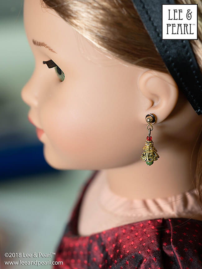 It's Day Four of Lee & Pearl Cyber Week, and we have lots of doll treats for you — a round-up of all our previous Christmas and Chanukah holiday crafts, like these beautiful filigree Christmas Tree earrings for dolls.