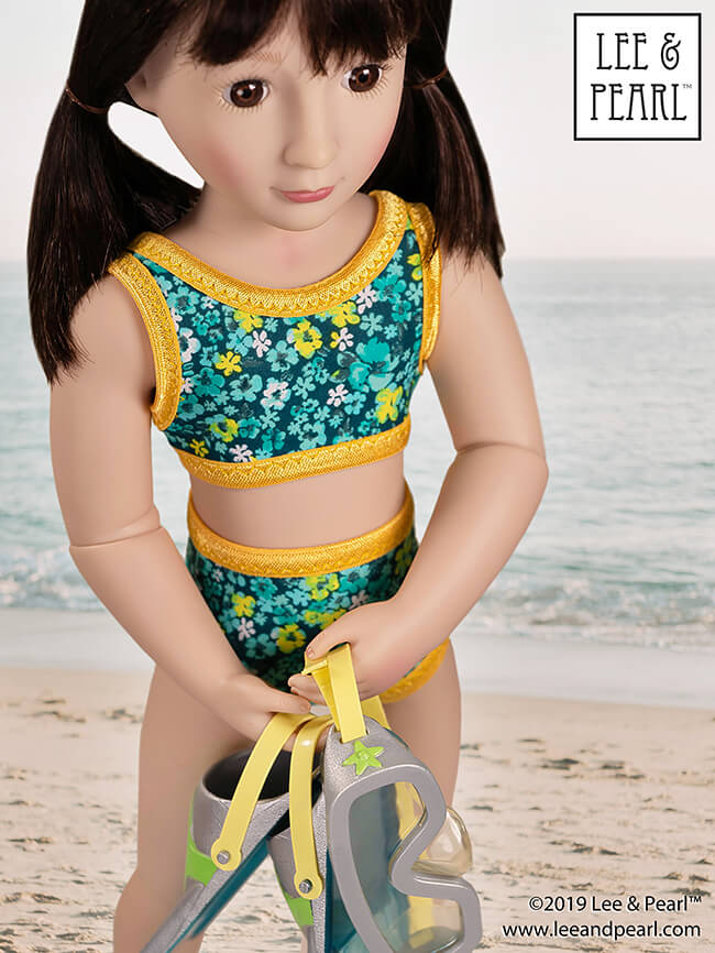Welcome summer with Lee & Pearl and our prettiest doll swimsuit pattern — Pattern 1058: Retro Ruffled Swimsuit and High Waisted Bikini for Dolls — NOW AVAILABLE for 16 inch A Girl for All Time® dolls and 14 1/2 inch WellieWishers® and similar dolls, as well as 18 inch American Girl® dolls.