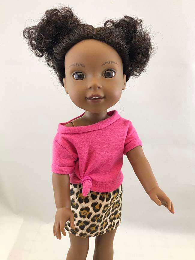 Look who's making L&P Pattern 1983: She's a Maniac Workout T-Shirt for Dolls... At the end of the design process, we send a draft pattern to our crack team of testers, and it's always a joy to see what they come up with. Join as we share inspirational images of so many different interpretations of our adorable, adaptable pattern -- like this raspberry pink WellieWishers tee by Rebecca F. 