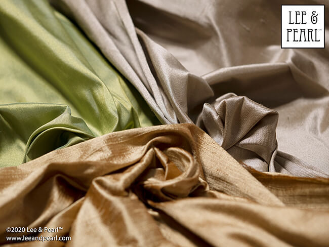 Treat yourself to a surprise fabric gift this holiday season! We're calling our 2020 Lee & Pearl Mystery Bags the SILKEN LUXURY HOLIDAY edition because each bag will contain TWO half yard pieces of shimmering 100% silk dupioni or shantung taffeta, along with materials chosen from our velvets, velveteen, lamé, crinkle rayon, sateen, brocade, faux leather, sequin-studded jersey and anything else we can find that sparkles, rustles, shimmers or shines. Don't wait — once this edition is SOLD OUT, you'll have to wait for the next sale in 2021.