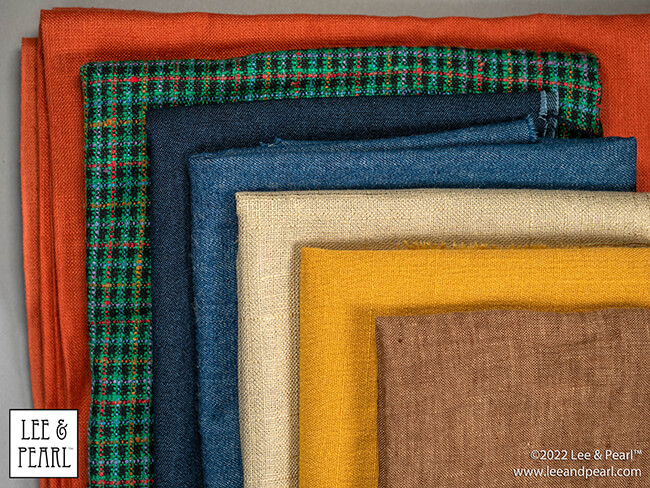 It's Mystery Bag Day! The 2022 Lee & Pearl Fabric Mystery Bags arrive in our Etsy store at 12 noon central on Friday, 12/02/22.
You've been so good all year and now you deserve something special. That's why we've tucked so many special things into each of our 2022 Lee & Pearl Fabric Mystery Bags.
Don't wait too long to check out and give yourself the gift of beautiful fabric. This year we have two special, limited edition Mystery Bags that also include BONUS PACK options, as well as our standard treat bags stuffed with beautiful fabrics for doll sewing!