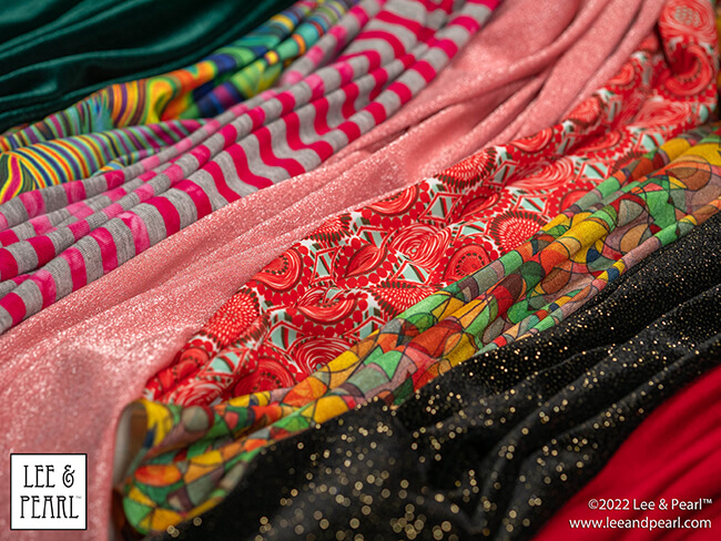 It's Mystery Bag Day! The 2022 Lee & Pearl Fabric Mystery Bags arrive in our Etsy store at 12 noon central on Friday, 12/02/22.
You've been so good all year and now you deserve something special. That's why we've tucked so many special things into each of our 2022 Lee & Pearl Fabric Mystery Bags.
Don't wait too long to check out and give yourself the gift of beautiful fabric. This year we have two special, limited edition Mystery Bags that also include BONUS PACK options, as well as our standard treat bags stuffed with beautiful fabrics for doll sewing!