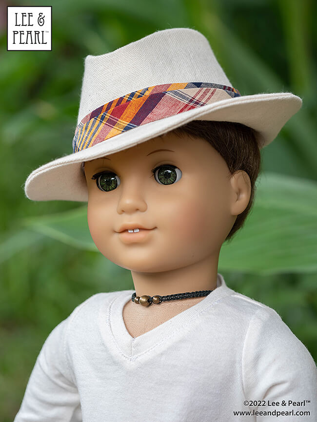 Introducing our new FREE pattern for mailing list subscribers — Lee & Pearl Pattern 2023: The Fedora Hat for 18", 16" and 14 1/2" Dolls. For this pattern, our designer reimagined iconic molded hat elements as flat pattern shapes and seams. 

That's right — this is an entirely SEWN hat. And it's sized to fit all three of our favorite dolls: American Girl, A Girl for All Time and WellieWishers and similar dolls.

Join the Lee & Pearl mailing list at www.leeandpearl.com and get this pattern as our exclusive FREE gift!