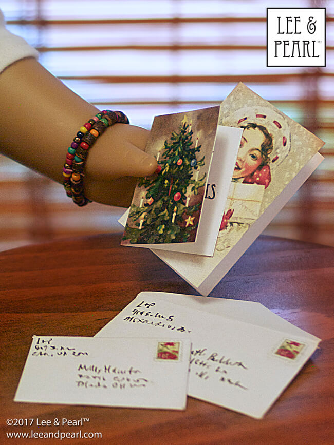 All this week, we have showcased last minute gift ideas for 18 inch doll lovers in Lee & Pearl newsletters. Today, we have doll GIFTS FOR YOU. Please download and enjoy our FREE contemporary Christmas card printable, FREE vintage Christmas card printable, FREE Holiday Stocking pattern and FREE Knitted Slipper pattern for dolls. Happy Holidays and Merry Christmas from Lee & Pearl!