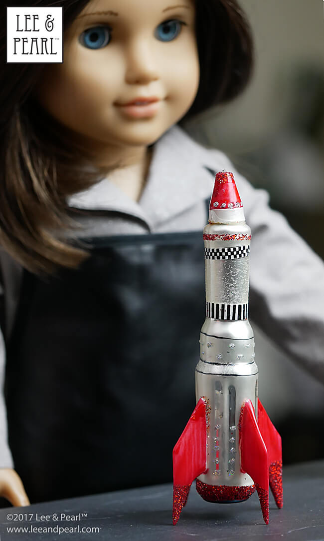 It's Day Four of Lee & Pearl Cyber Week, and we have lots of doll treats for you: a round-up of all our previous Christmas and Chanukah holiday crafts — and a reminder to check out the seasonal ornament selections for doll-scaled items like this toy rocket!