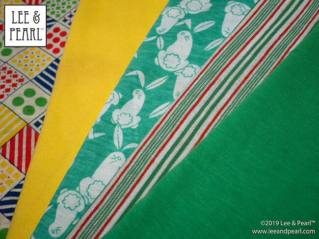 SET YOUR CLOCKS! The 2019 edition of the Lee & Pearl Mystery Bag Sale will go live in our Etsy store at 1PM (EST) on Friday, December 6. Our fabric Mystery Bag sales are always sell-out events, and this year the materials we have to share eclipse all previous offerings. Check out our newsletter photos of a few of the fabrics we’ll be generously stuffing into Priority Mail bags, then make sure you’re in our Etsy shop at 1PM (EST) on Friday to get yourself your own mystery sewing present!