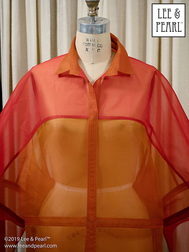 Make yourself something lovely out of our easy-to-sew silk organza. It really is as easy to work with as ordinary quilting cotton! Our pattern maker Pearl is making Vogue 1347 — a fashionable big shirt-jacket from designer CHADO Ralph Rucci — out of two colors of silk organza: no 29 Tomato and no 97 Golden Russet. What would you like to wear this holiday season made out of beautiful, shimmering silks from Lee & Pearl?