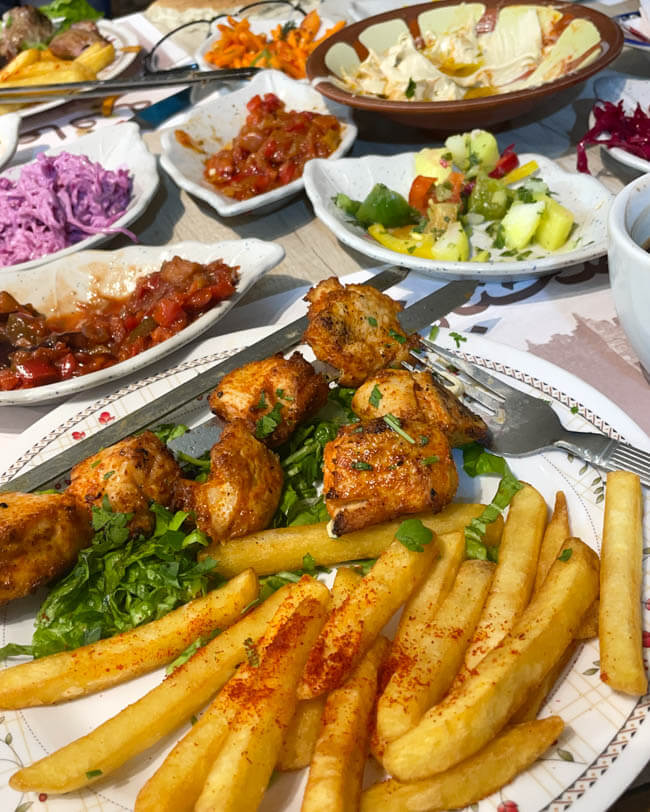 We're wrapping up our ISRAEL trip travelogue with a few last images of all the glorious COLORS of the country — the plants (the desert really blooms here), the markets, the textiles, the people and of course, the foods. Enjoy!