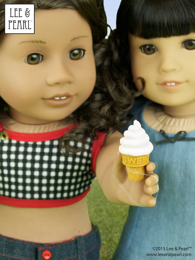 Our American Girl™ dolls brought Japanese eraser treats to the picnic! Our #26 wears a crop top made using Lee & Pearl Pattern #1058: Retro Ruffled Swimsuit and High Waisted Bikini for 18" Dolls, and a classic denim skirt from L&P #1041: Slim Skirts for 18" Dolls.Ivy wears a sundress made from the slip pattern in Lee & Pearl Pattern #1943: Molly Waves Goodbye. These patterns are available in our Etsy shop at https://www.etsy.com/shop/leeandpearl