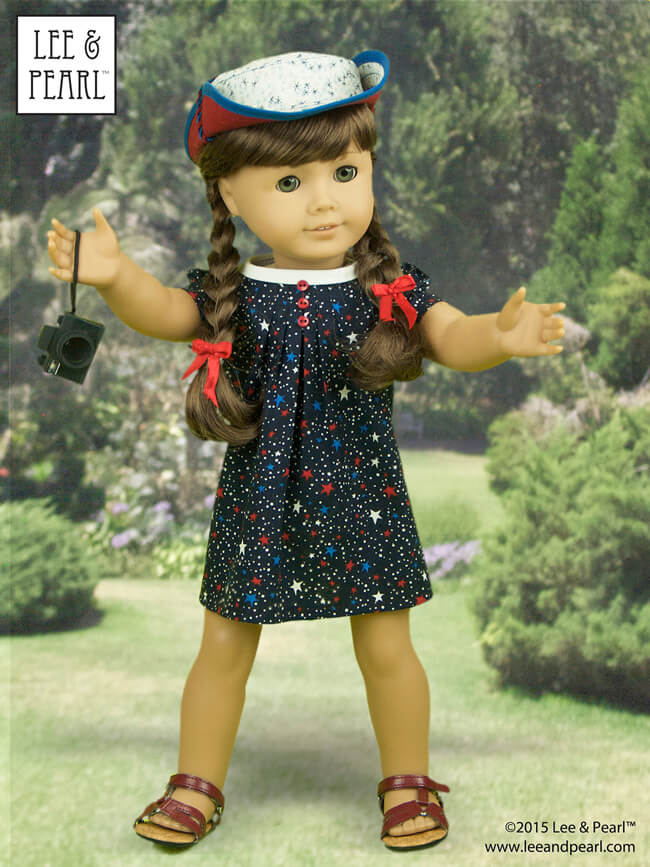 It can't be the Fourth of July without American Girl™ Molly!Our spirited girl looks every inch the patriot in a star-spangled dress made using Lee & Pearl Pattern #1033: Bonjour, Paris Mini Wardrobe for 18" Dolls and her jaunty sunhat was made using L&P #1007: Bush Hat or "Boonie" for 18" Dolls. These patterns are available in our Etsy shop at https://www.etsy.com/shop/leeandpearl Molly's tiny camera is a Kikkerland LED keychain — a must-have dolly accessory in our book.