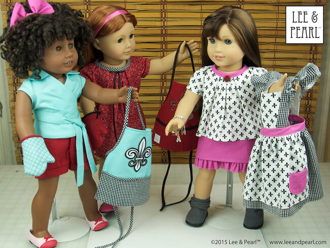 We made an entire Paris-themed wardrobe for our American Girl™ doll Grace and her friends using our favorite Lee & Pearl patterns and just ONE Bonjour, Paris Fabric & Trim Kit, a set of six coordinated fat quarters of high quality cotton fabric, with matching ribbon and ribbon flower trim. We made three full outfits — several pieces each for Grace and her friends Ella and Maddy — out of just one kit. Get the kit while supplies last in our Etsy store at https://www.etsy.com/shop/leeandpearl